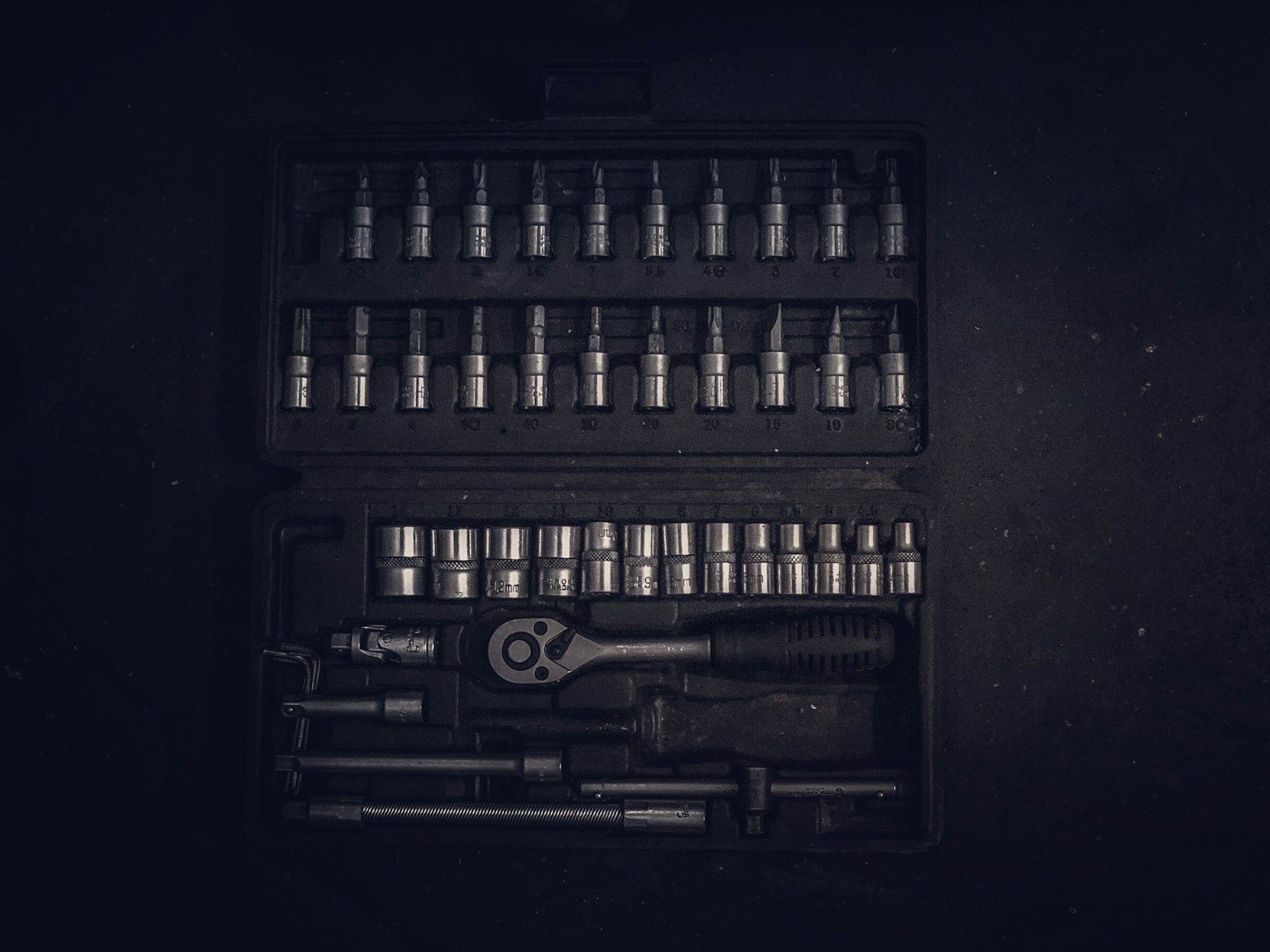 A neatly organised case of precision sockets and tooling